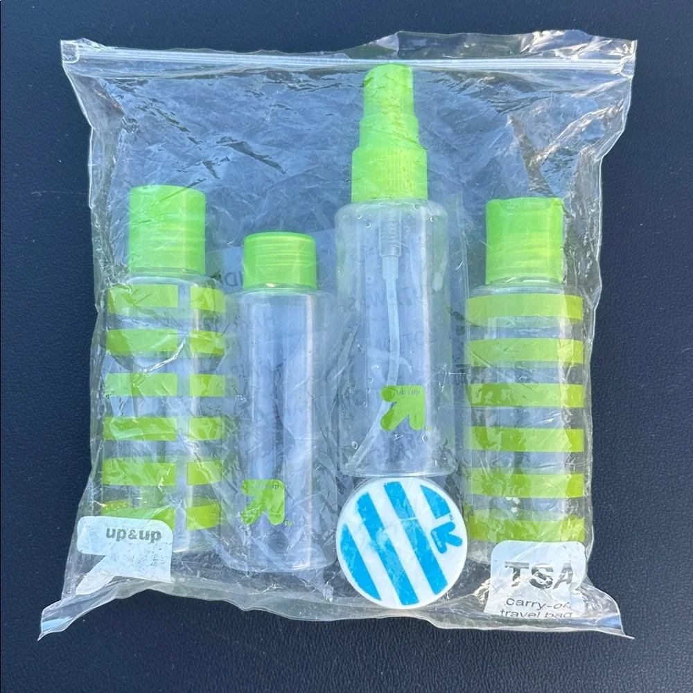 Universal Travel set of Power Adapter, strap, lock & cosmetic travel bottles-new
